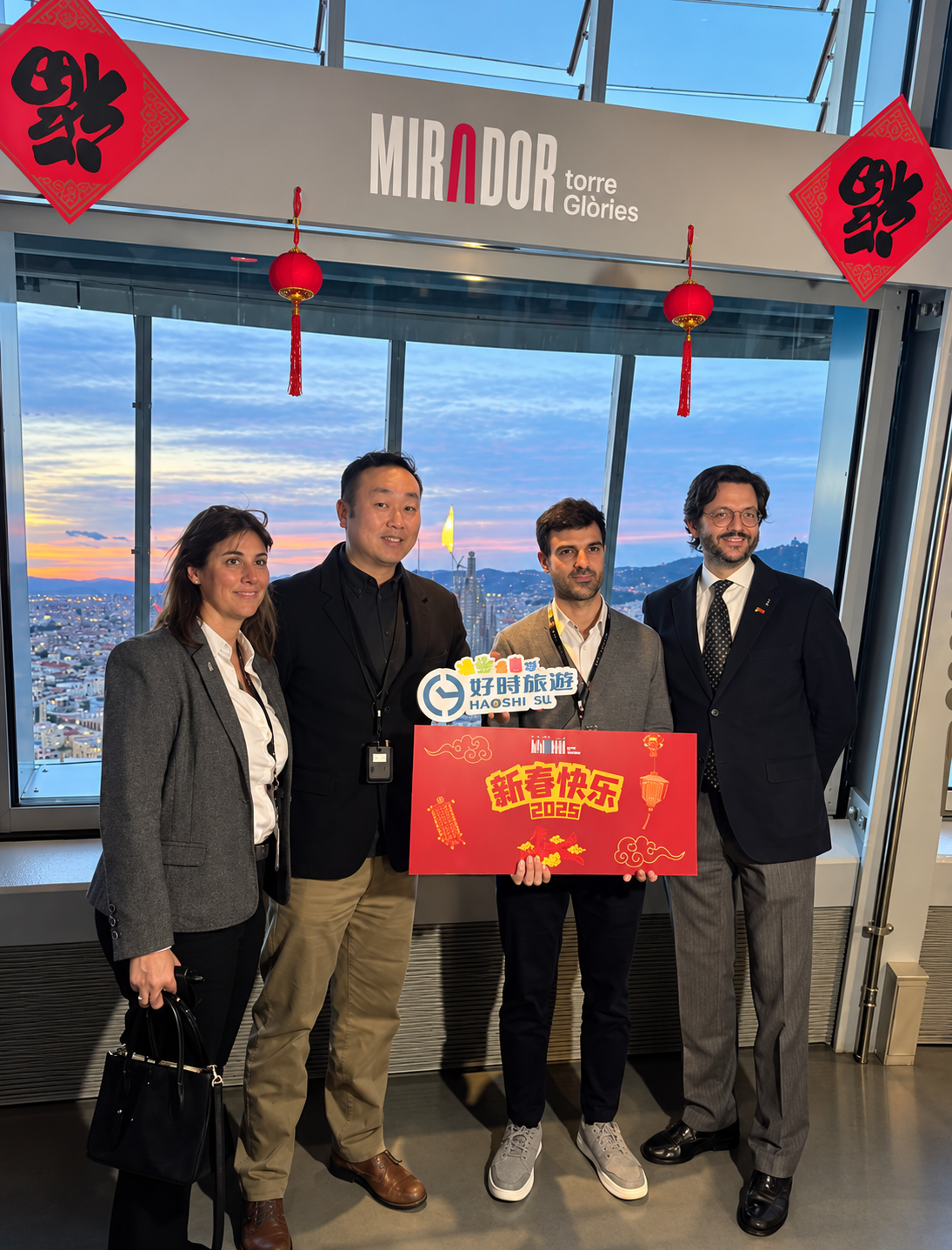 IBERIA CAIXCAR S.L. team with Mirador Torre Glòries representatives during Chinese New Year 2026 in Barcelona