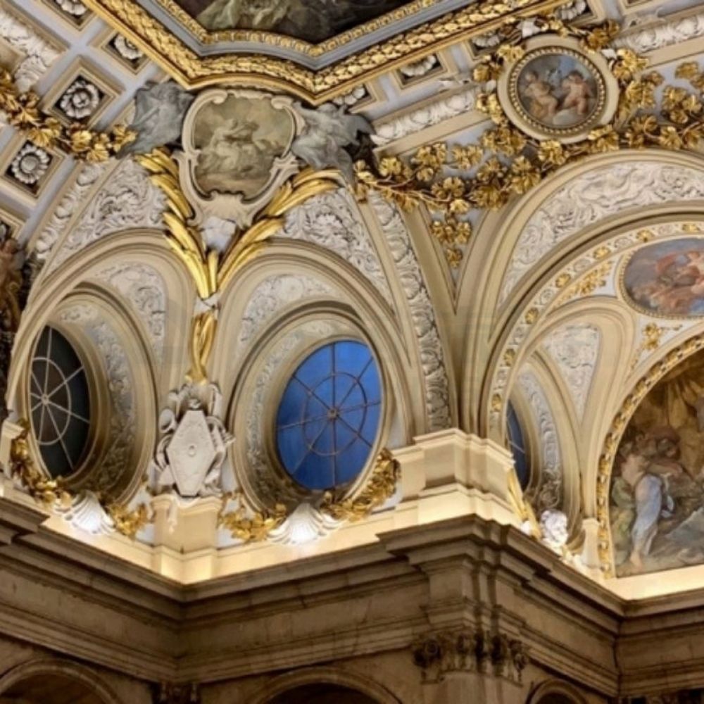 Ornate ceiling and architectural details inside the Royal Palace of Madrid