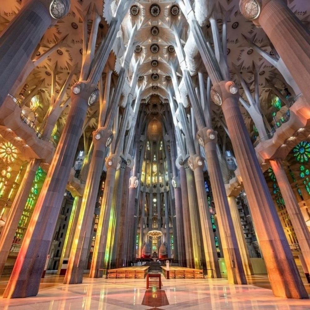 Colorful stained glass and interior architecture of Sagrada Família in Barcelona